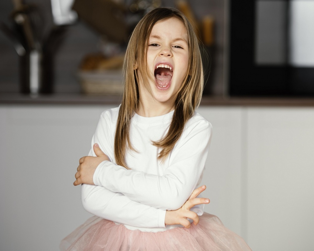 front-view-girl-tutu-skirt-with-mouth-wide-open.jpg