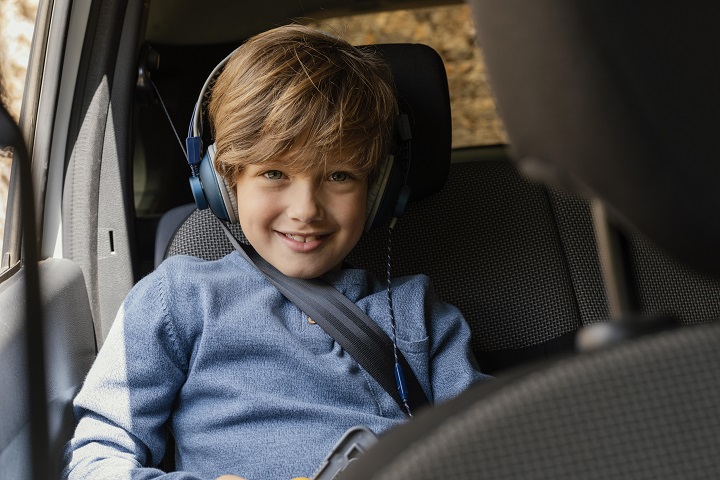 portrait-boy-car-with-headphones-listening-music.jpg