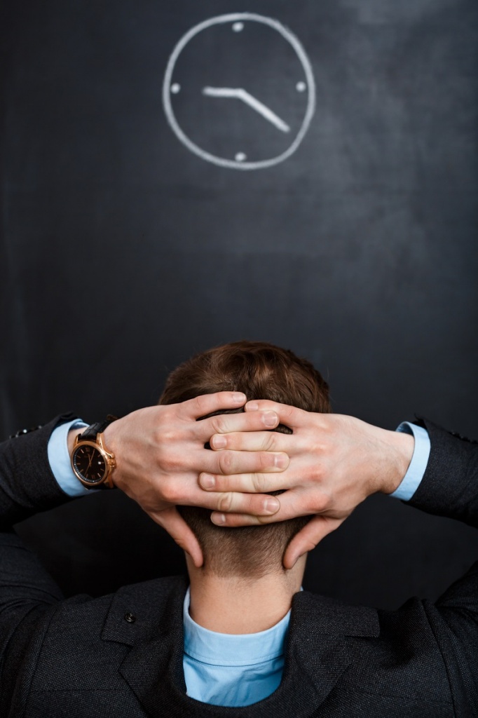 rear-view-business-man-looking-clock-hands-his-hea.jpg rear-view-business-man-looking-clock-hands-his-hea.jpg