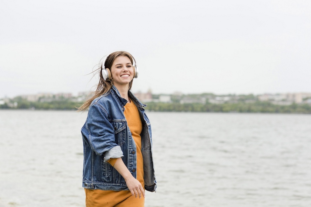 female-enjoying-seaside-and-music.jpg