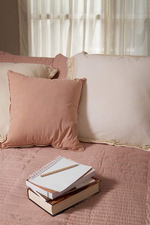 high-angle-cozy-bed-arrangement-with-notebook.jpg